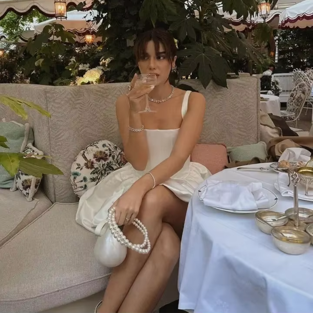 Oyster Glow Acrylic Clutch with Pearl Handle