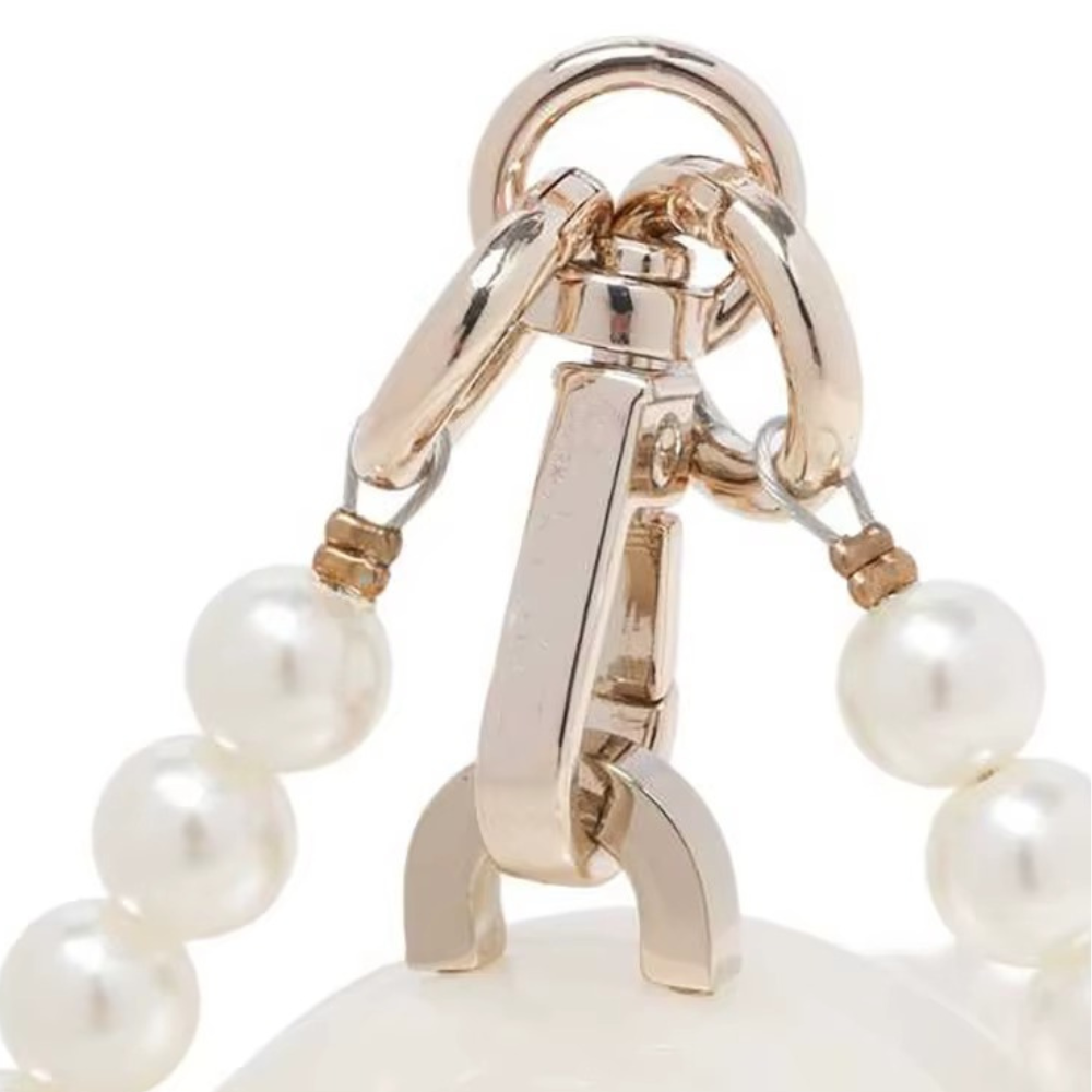 Oyster Glow Acrylic Clutch with Pearl Handle