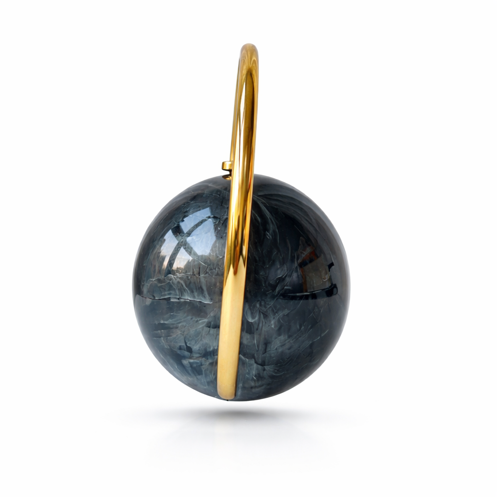 https://www.floreastore.com/products/orb-marble-acrylic-clutch?variant=50851727802656